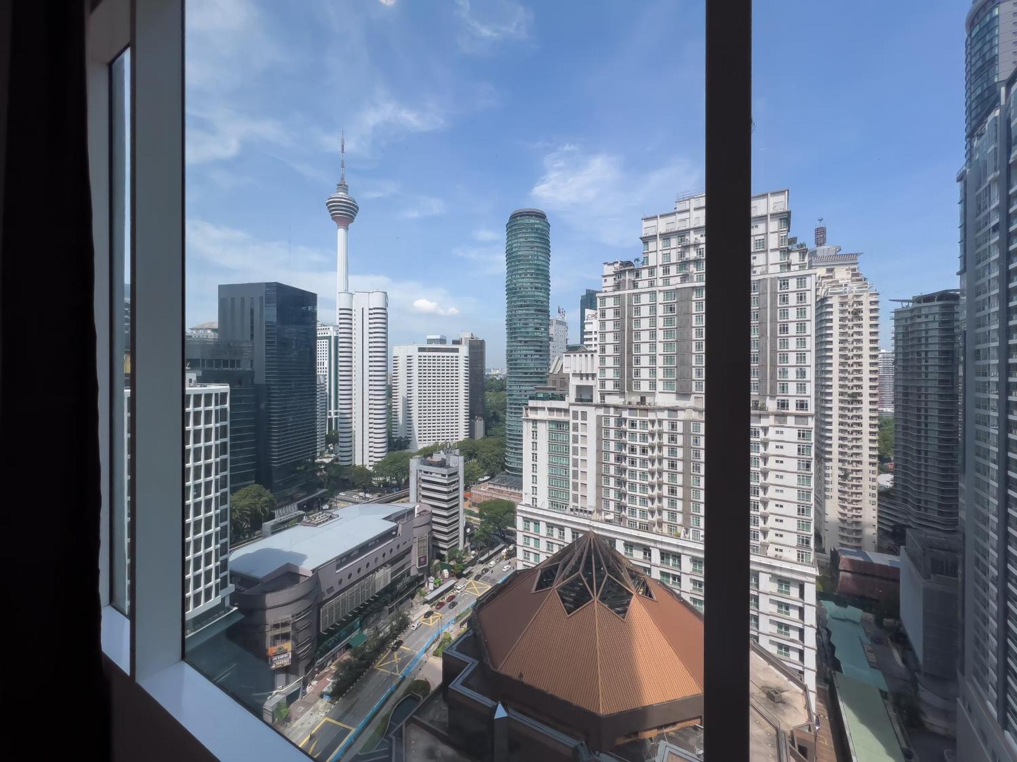 Soho Suites Klcc By Guesthouse Куала-Лумпур Екстер'єр фото